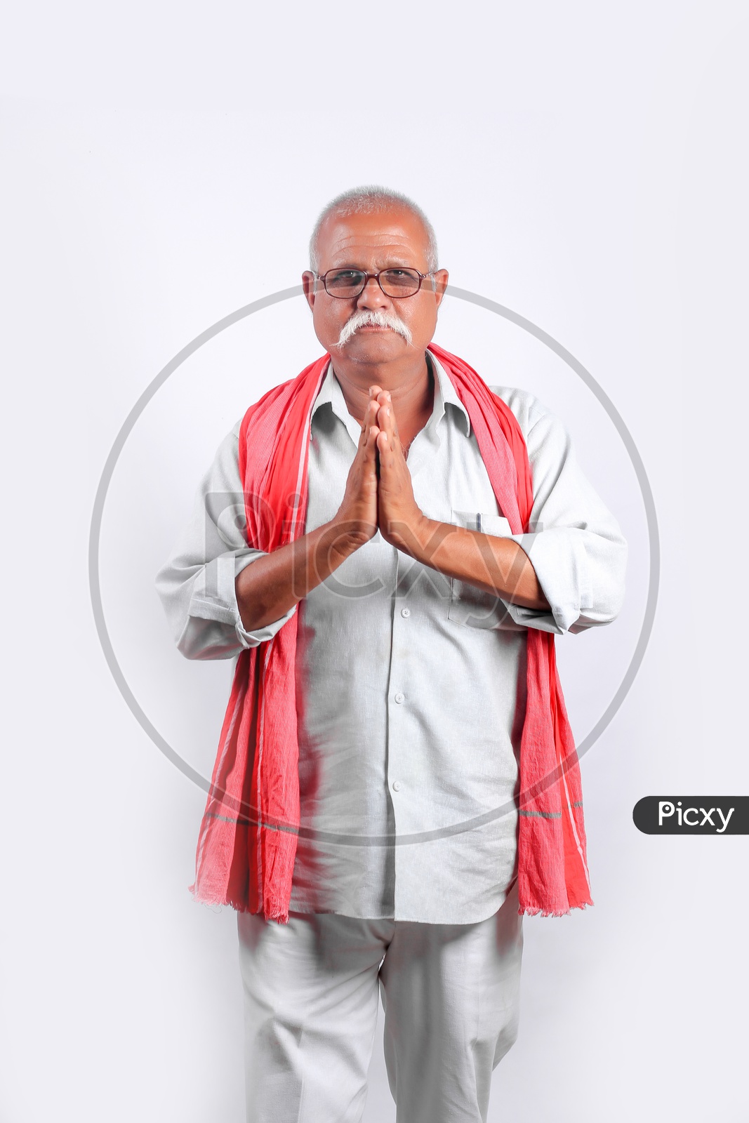 Indian  or Asian Old Man With Namaste gesture on an Isolated White Background