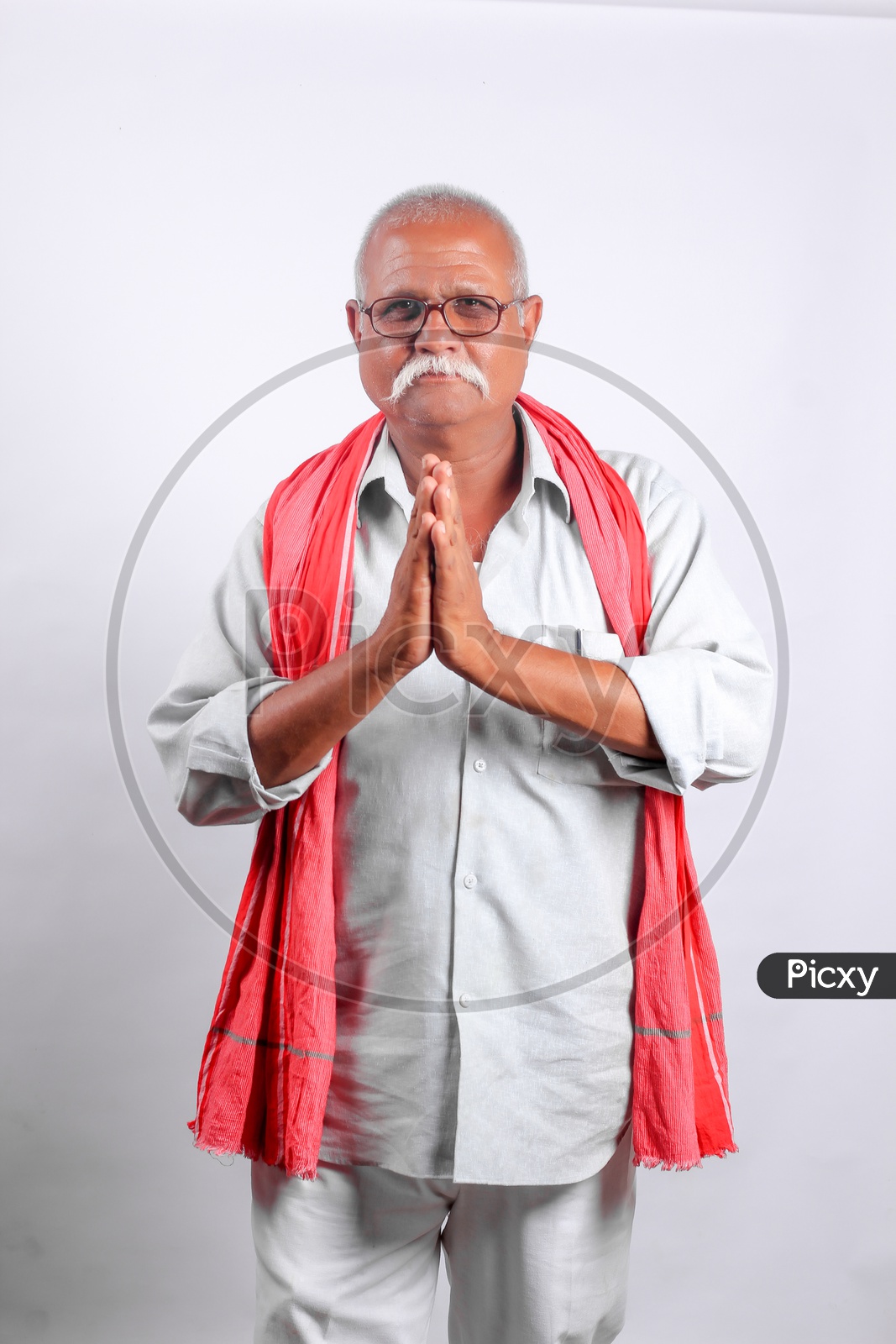 Indian  or Asian Old Man With Namaste gesture on an Isolated White Background