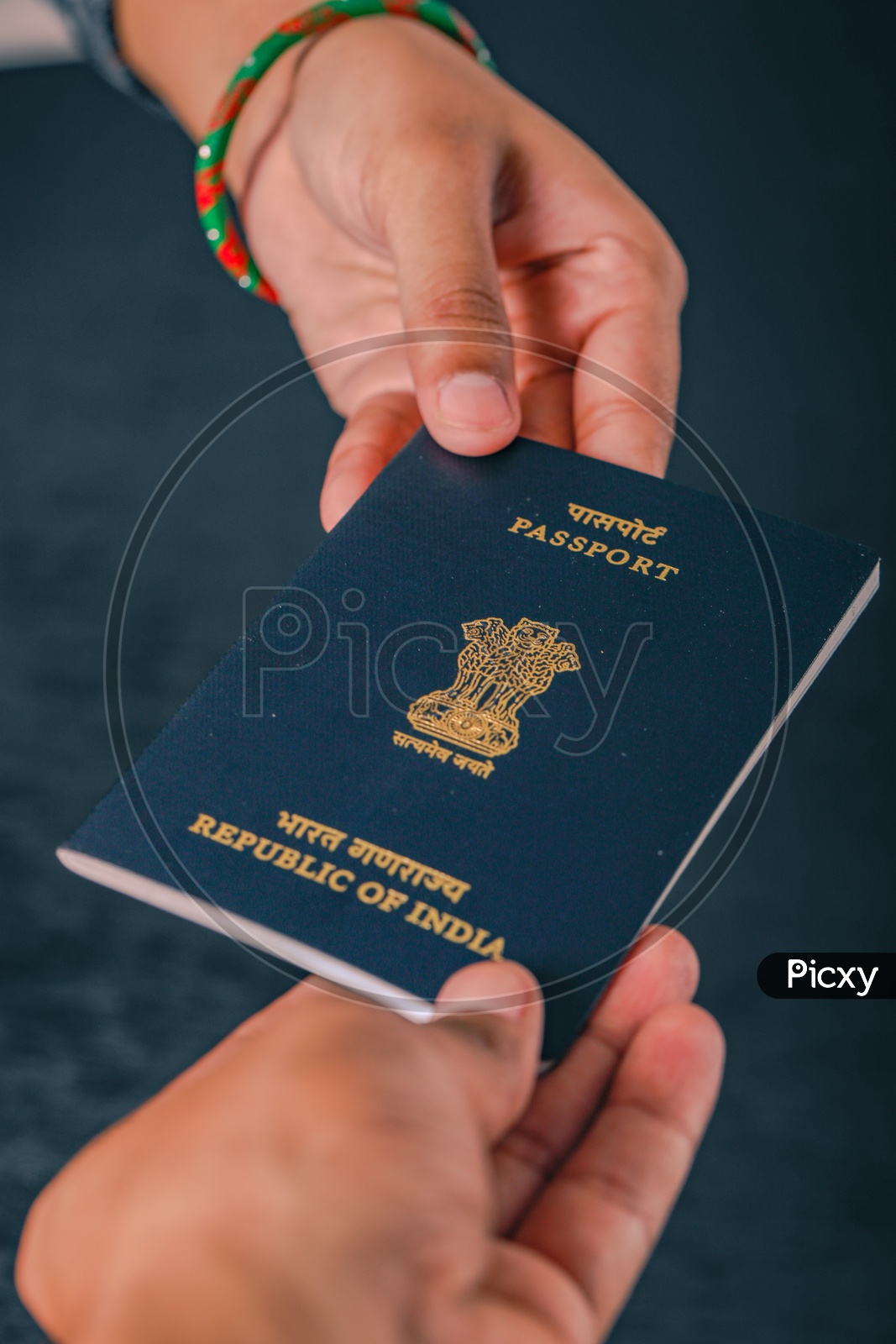 Indian Passport In Hands Closeup  , Showing Passport