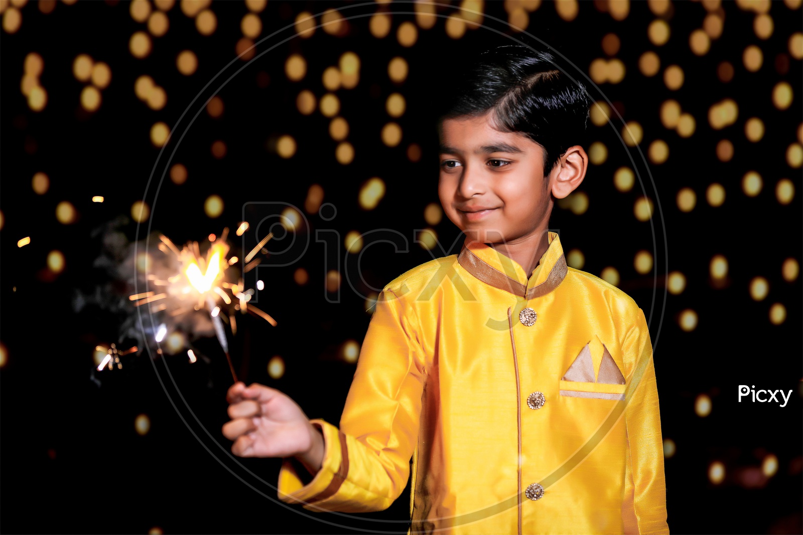 Indian Boy Or  Kid Celebrating Diwali Festival with Crackers