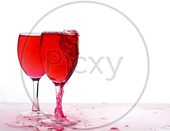 Red Wine In Wine Glasses On an Isolated White Background
