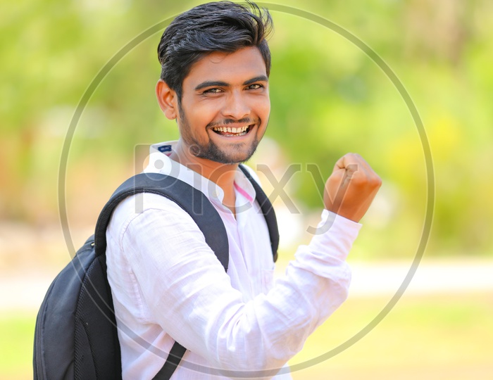 Confident Indian College Student With Success Gestures