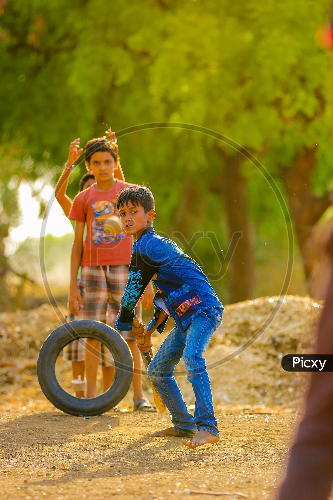 Indian Rural Village Kids Playing Cricket Outdoor