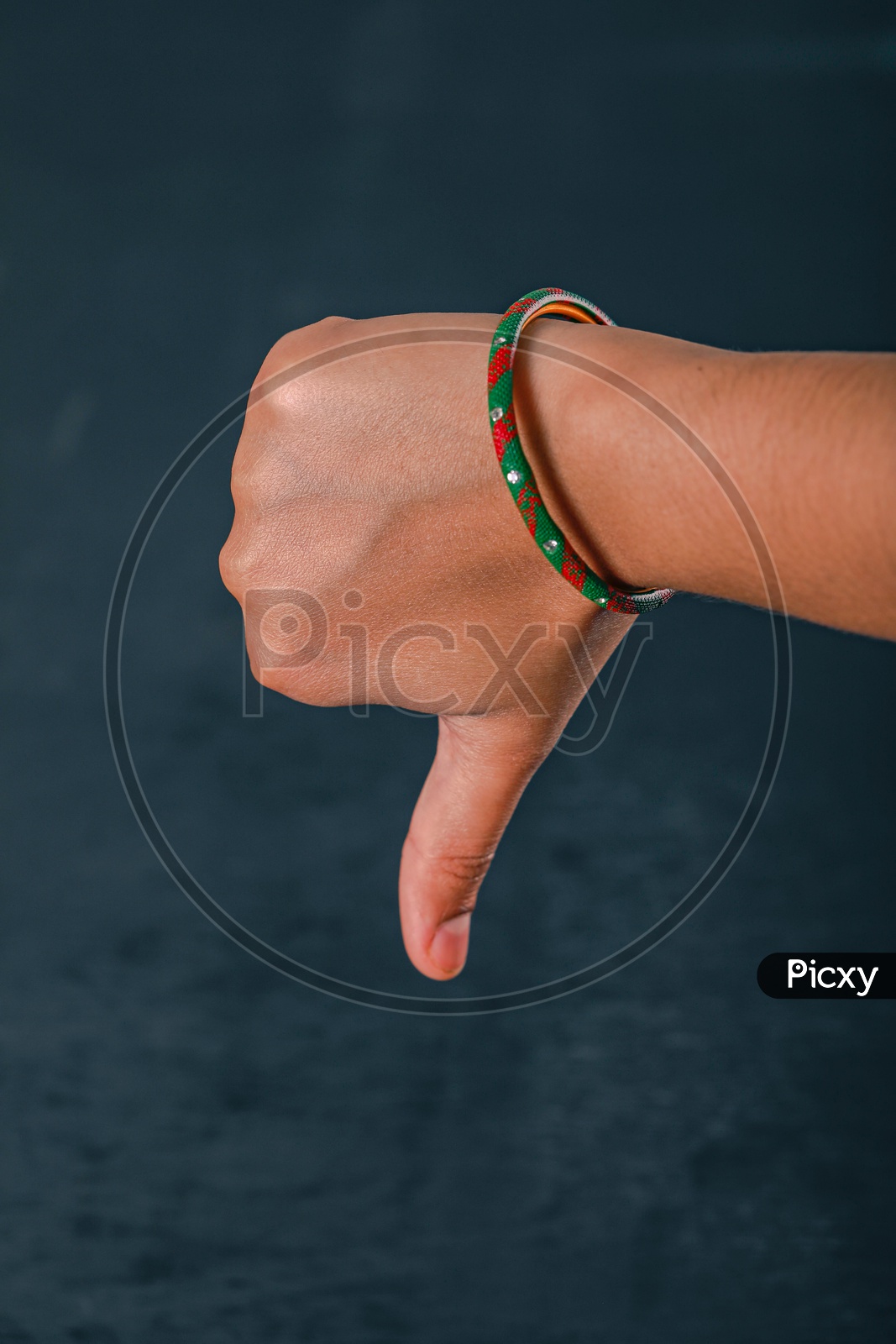 Woman Hand Showing Thump down  Gesture Closeup