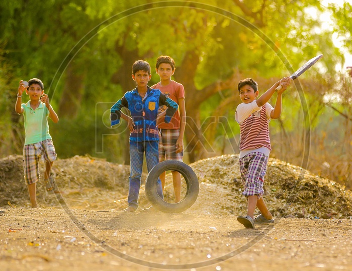 Indian Rural Village Kids Playing Cricket Outdoor