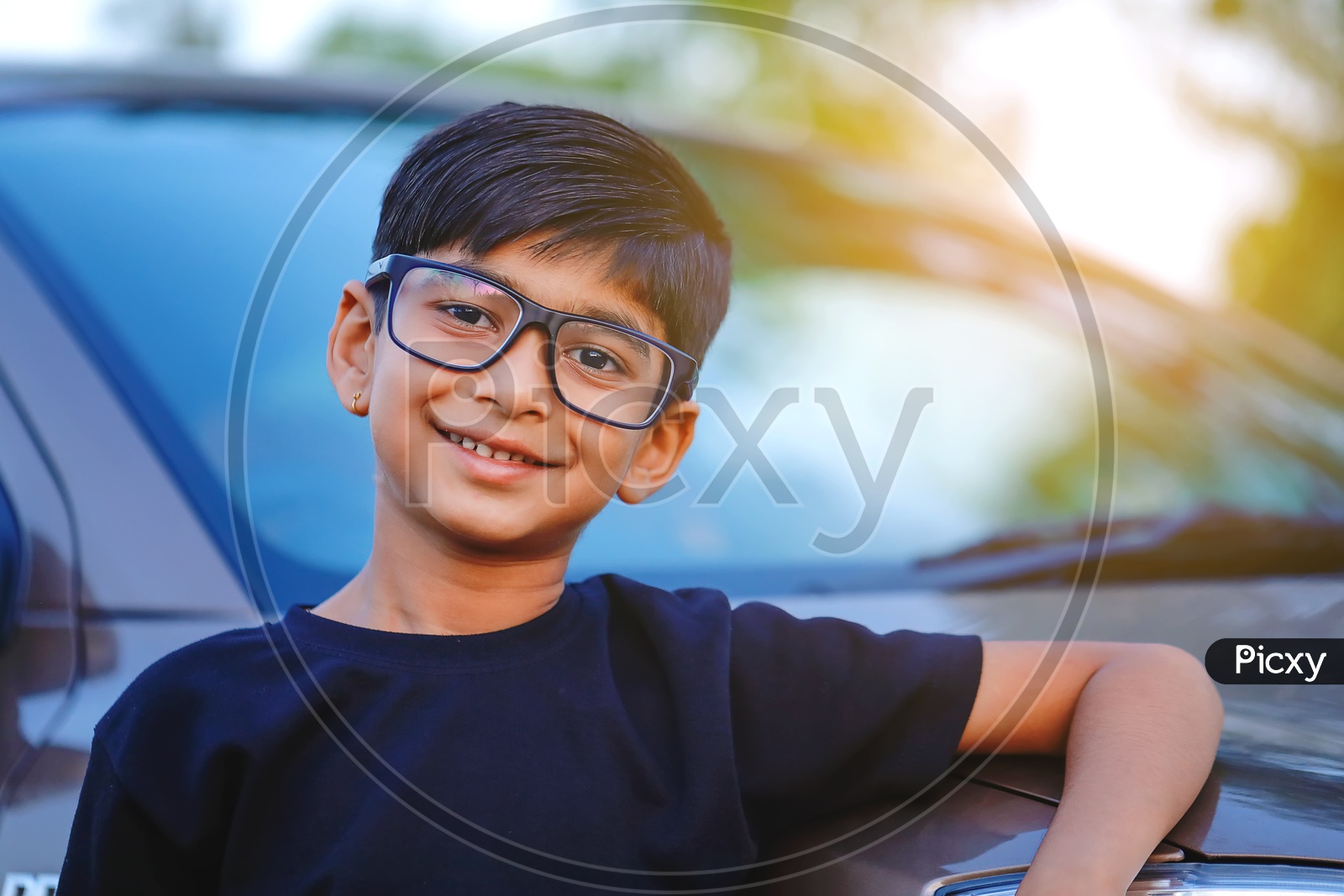 Indian Young Kid or Child Wearing Spectacles And Posing