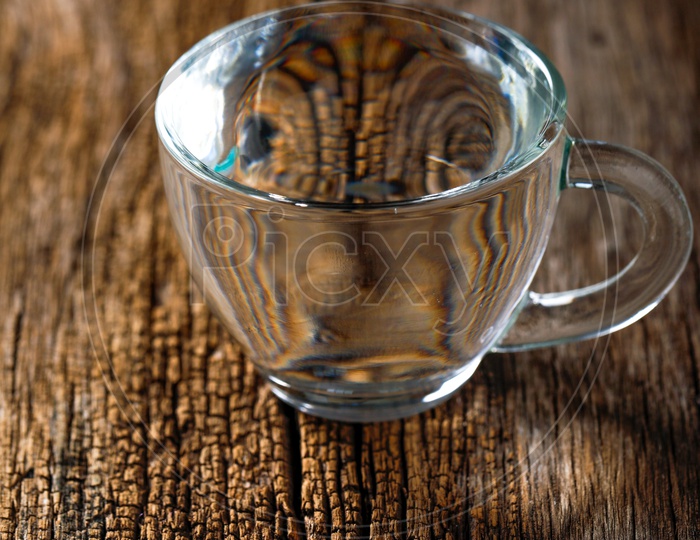 Empty Glass  Tea Cup On an Wooden  Table Background