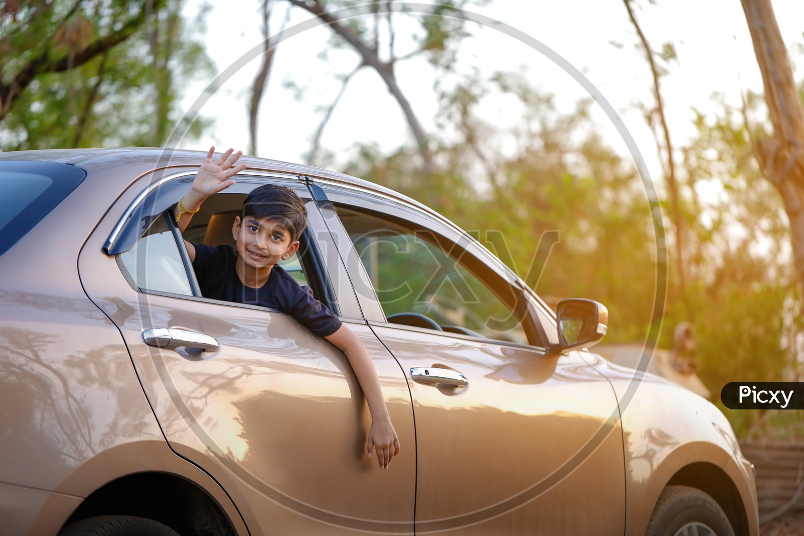 Indian Young Boy Or Kid Or Child Playing And  Posing Inside a  Car