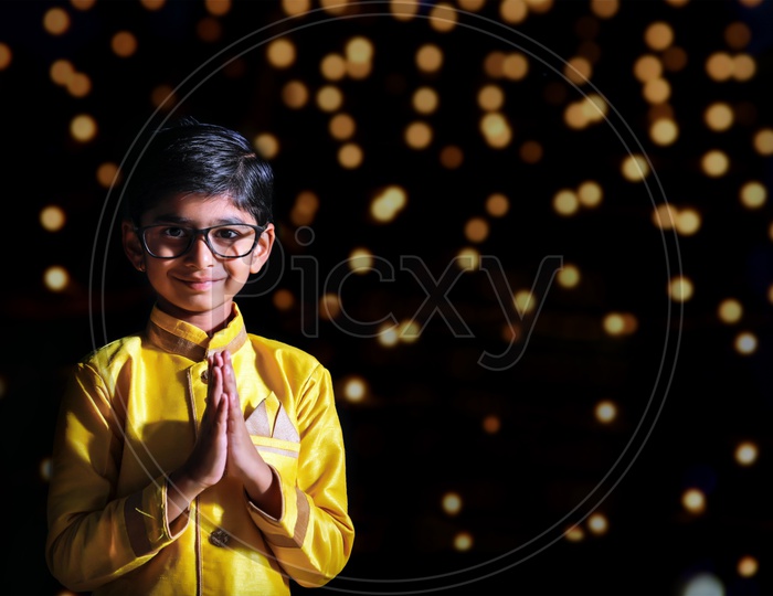 Indian Cute Young Boy or Kid Or Child In traditional Wear And Posing  on a Diwali Festival Day