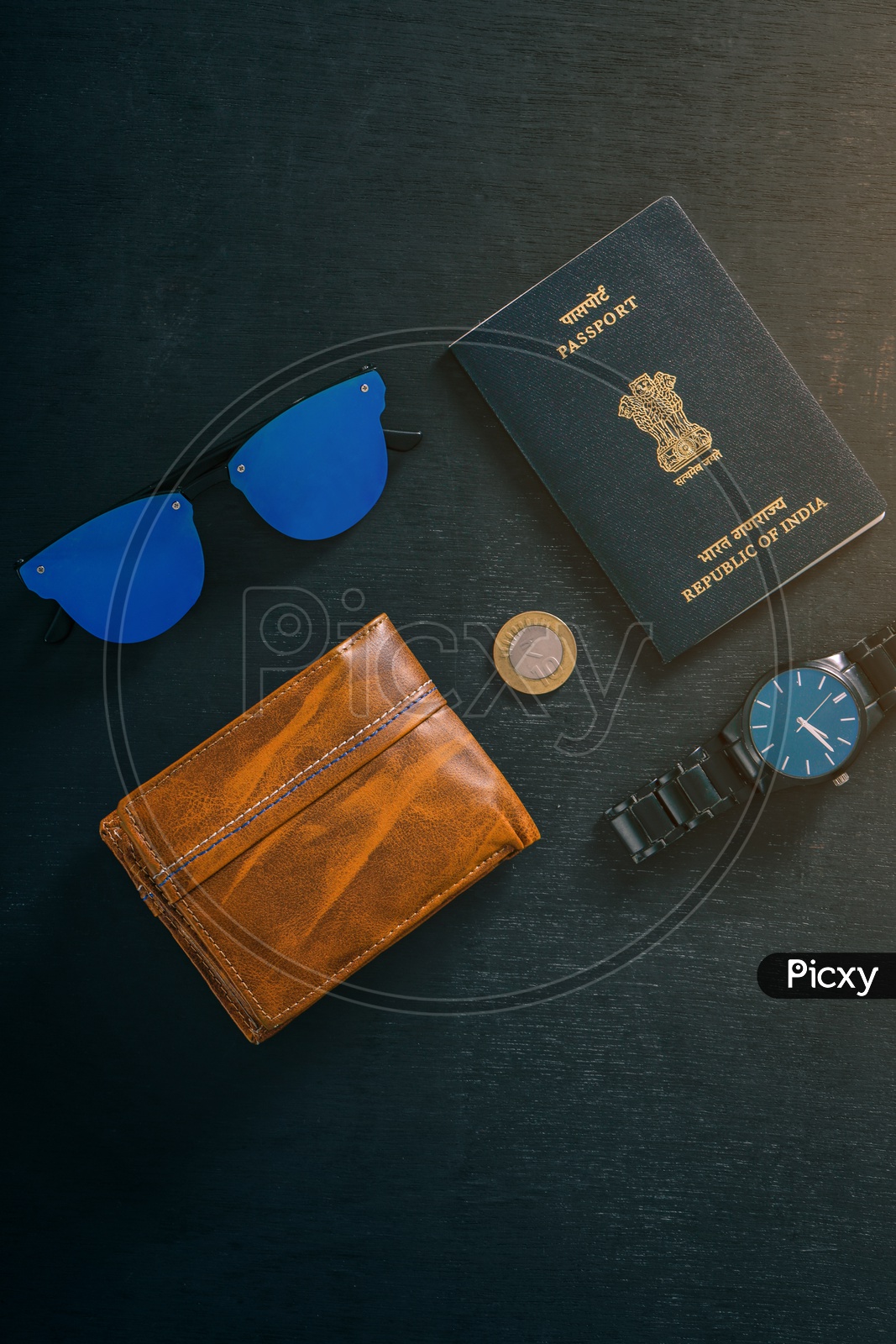 Travel Concept  Indian Passport , Watch ,wallet , Sun Glasses and Indian Coin