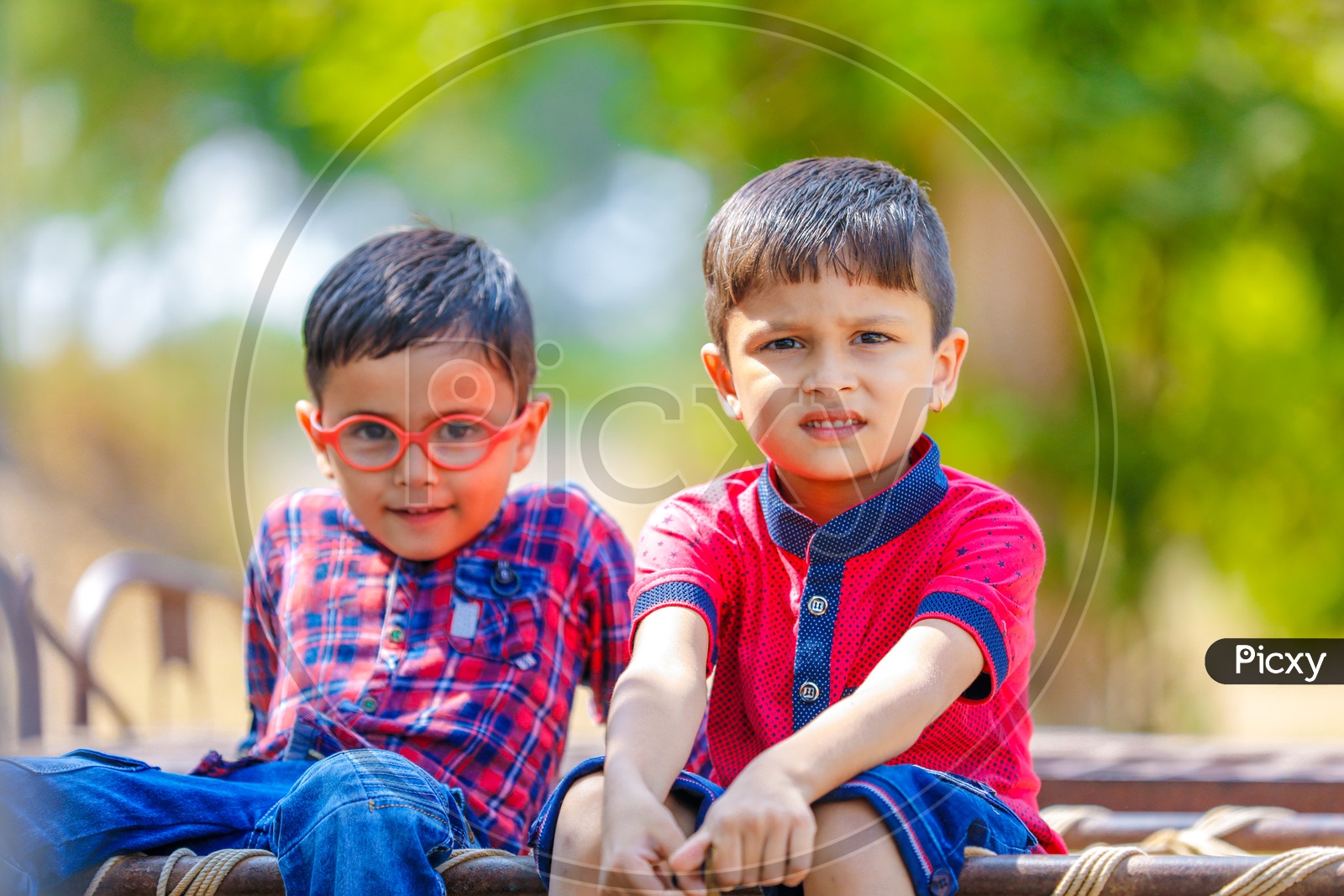 Two Cute Indian Kids Or Boys  or Siblings  or Friends  On Outdoor Background