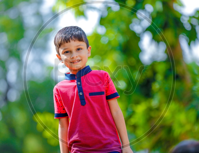 Image of Indian Boy With Multiple Expressions On Outdoor Background ...