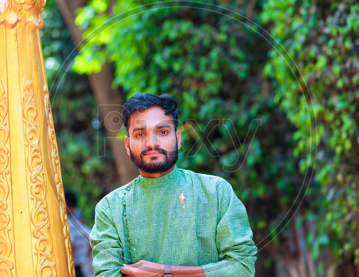 Indian Man Wearing Traditional Wear At a Function  and Posing