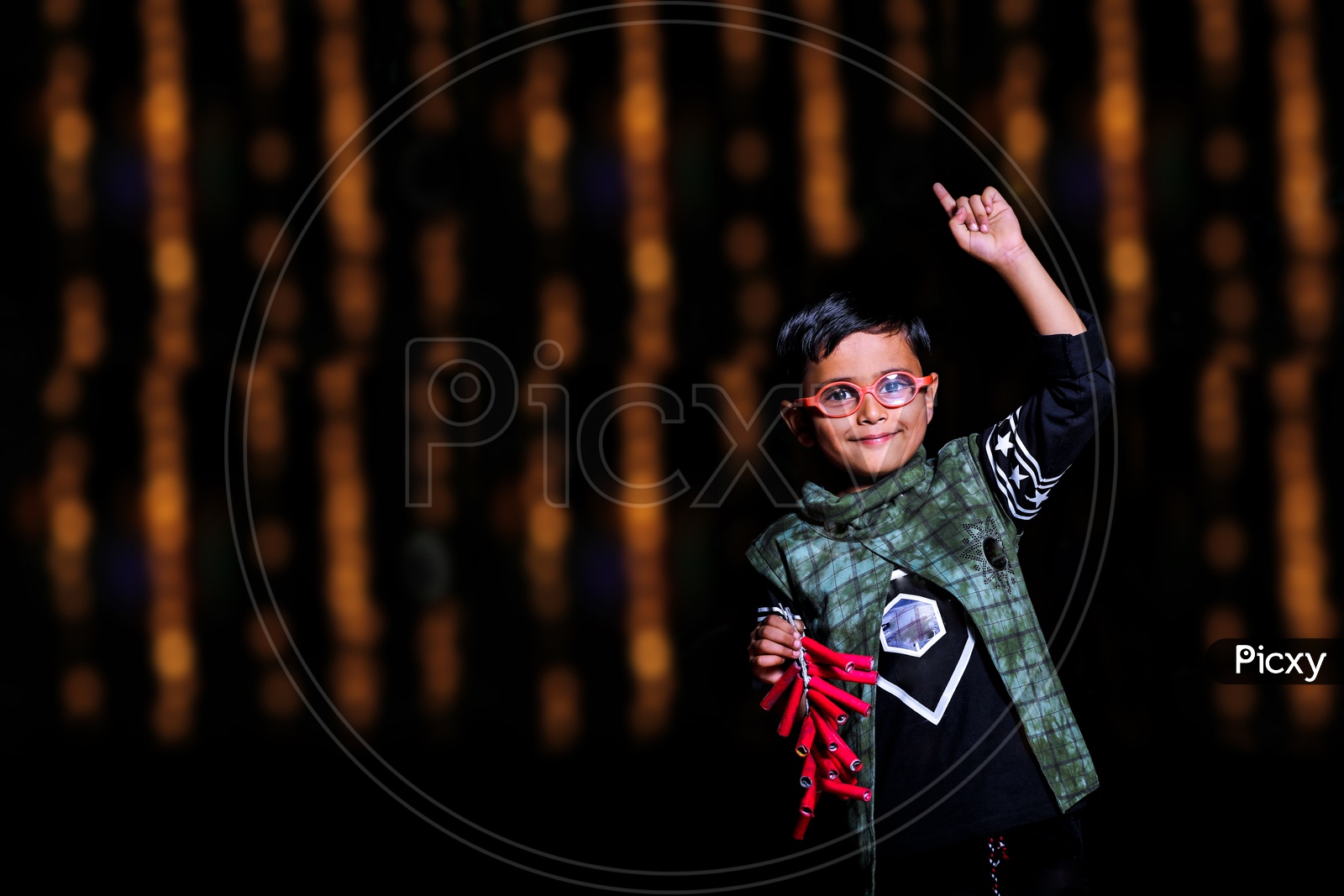 Indian Boy Or Kid Or Child  Celebrating Diwali Festival With Crackers