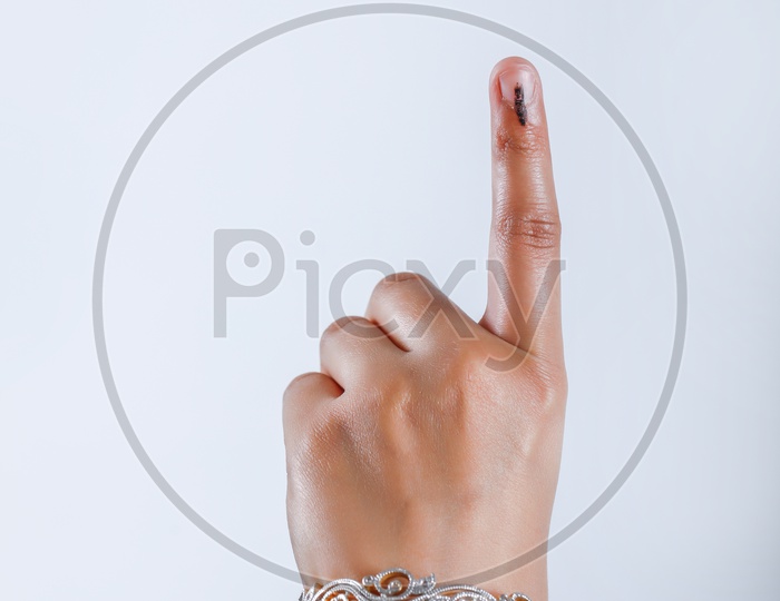 Indian Voter Hands Showing Inked Finger After Casting Vote in Elections