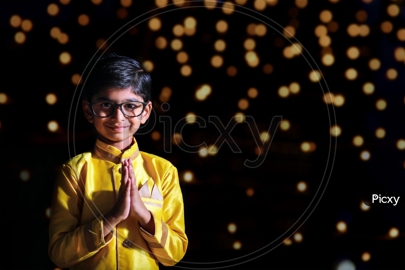 Indian Cute Young Boy or Kid Or Child In traditional Wear And Posing  on a Diwali Festival Day