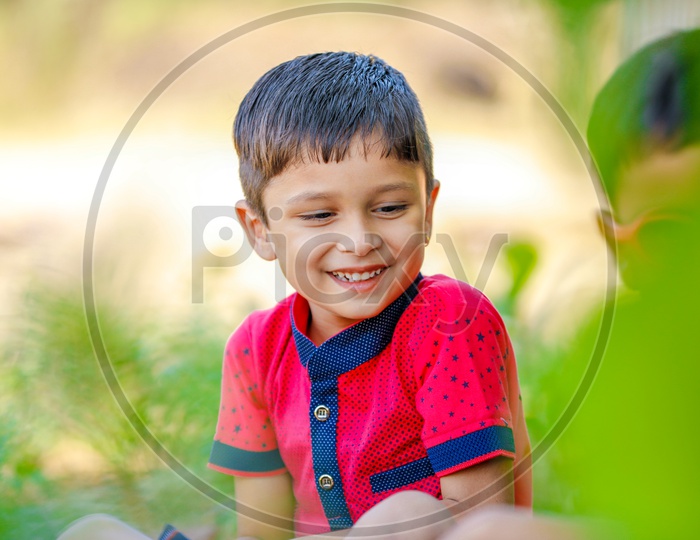 Indian Boy With Multiple Expressions On Outdoor Background