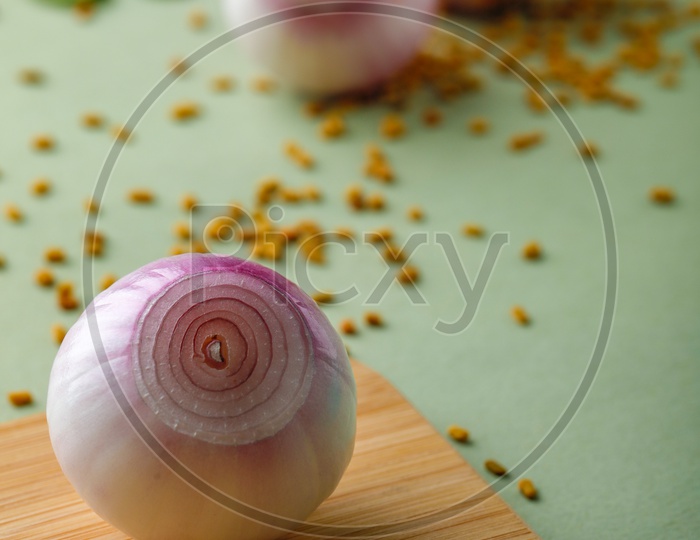 Red Onions Peeled  And Spices Sprinkled On an  Isolated Background