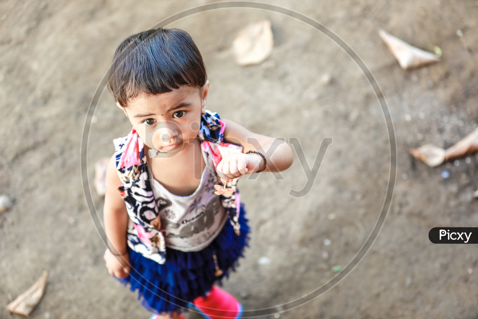 Cute Indian Girl Child Or Baby Girl Playing in a Park