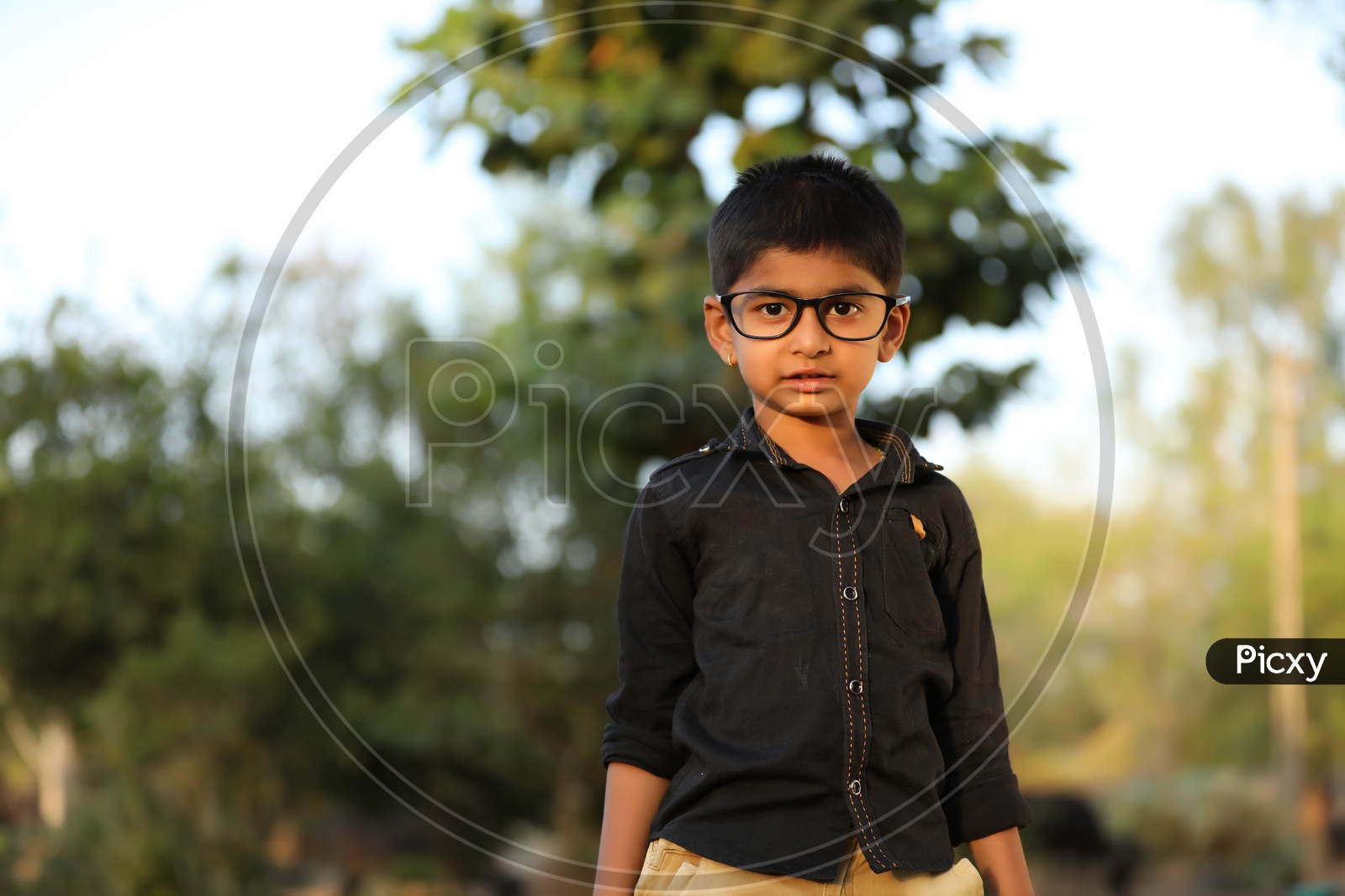 Indian Young  Boy Or Child Or Kid Wearing Spectacles And Posing