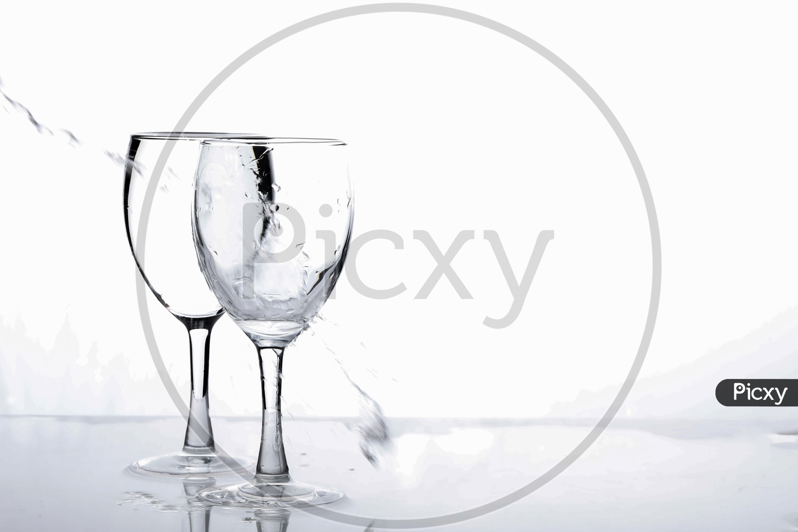 Wine Glasses Filled With Water On an Isolated White Background