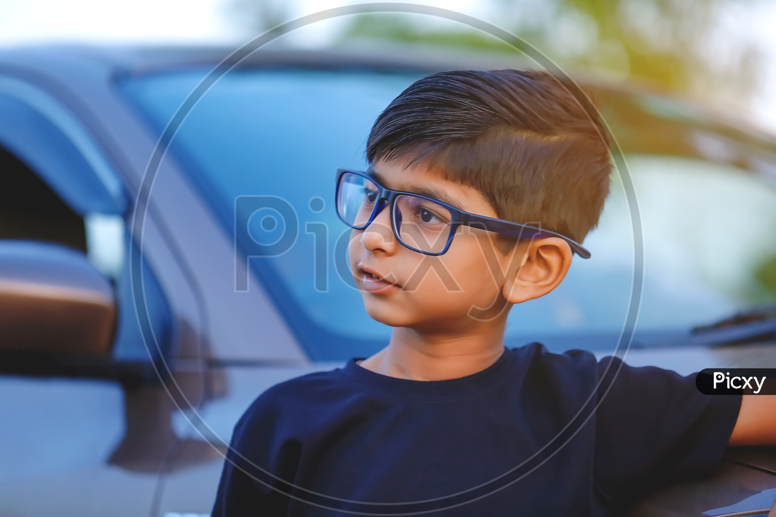 Indian Young Kid or Child Wearing Spectacles And Posing