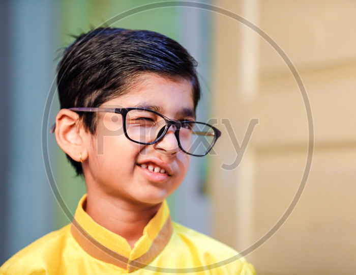 Indian Young  Boy Or Child Or Kid Wearing Spectacles And Posing