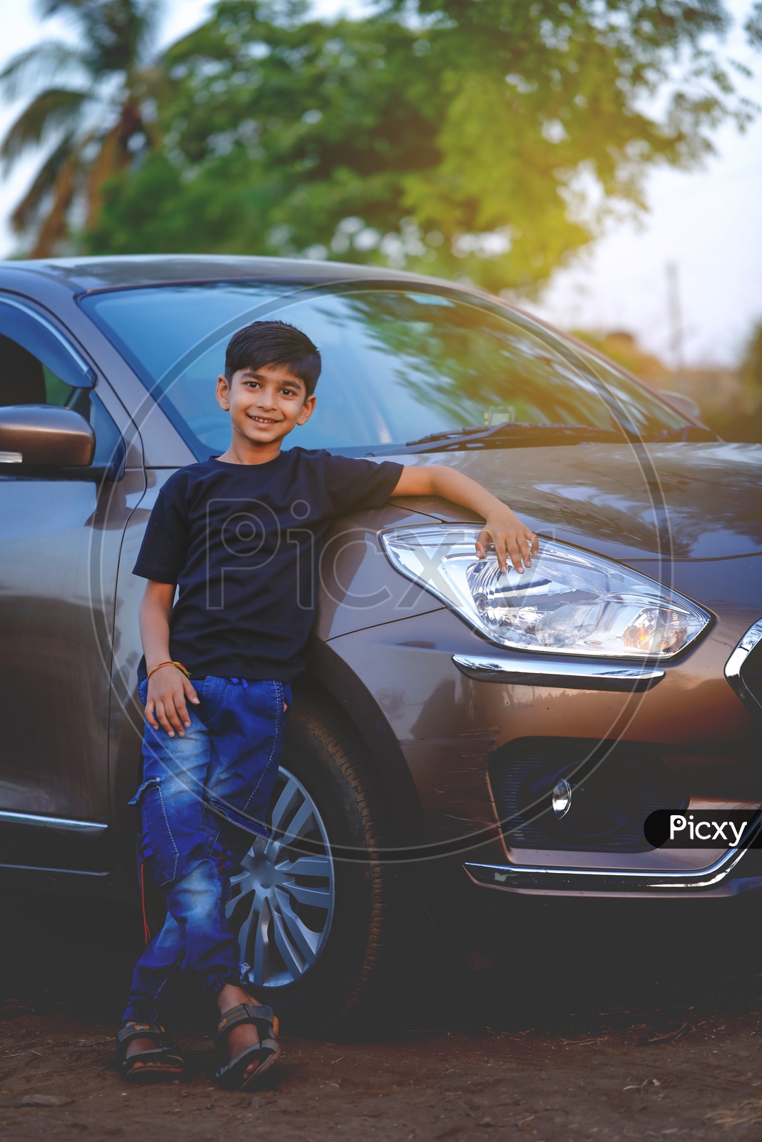 Indian Young Kid Or Child  Posing at a Car