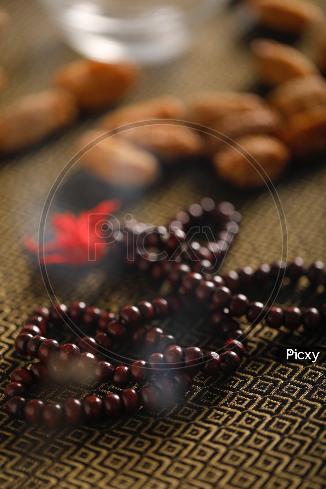 Dry Date Fruits  With Islamic Prayer beads on an Artistic Background   Backgrounds For Ramzan or Ramadan