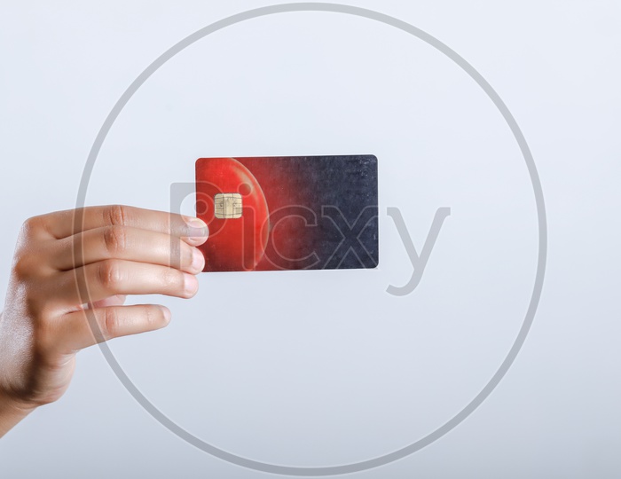 Credit Debit  Card Holding Hand Closeup On an Isolated Background