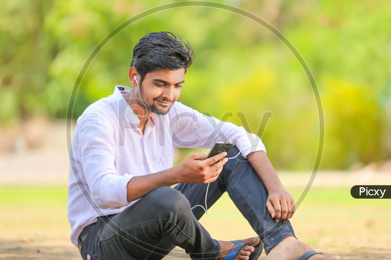 Indian College Student Using In Mobile Or Smartphone