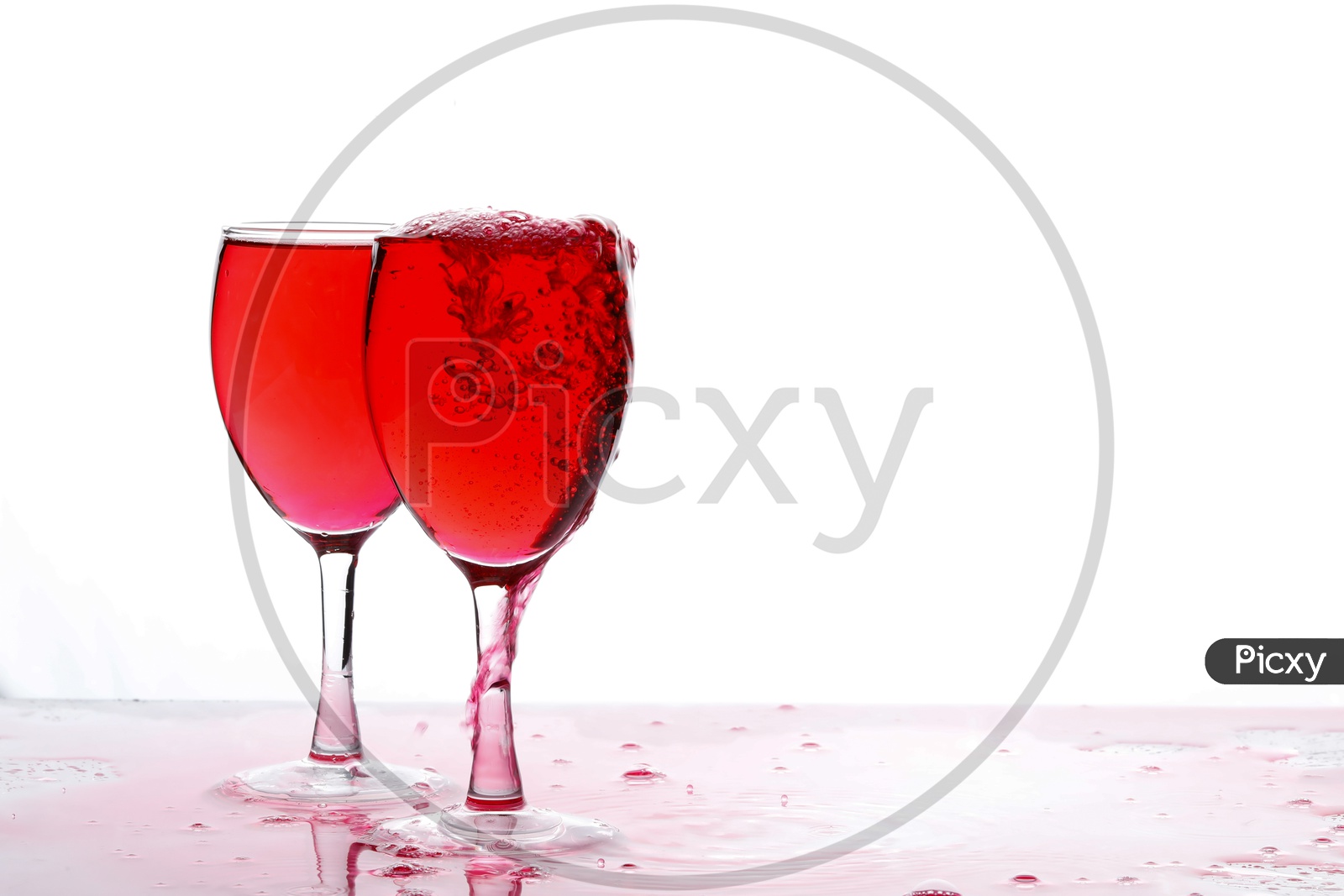 Red Wine In Wine Glasses On an Isolated White Background