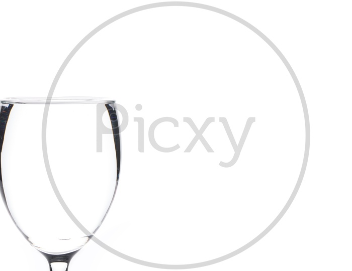 Water In Wine Glass On an Isolated White Background