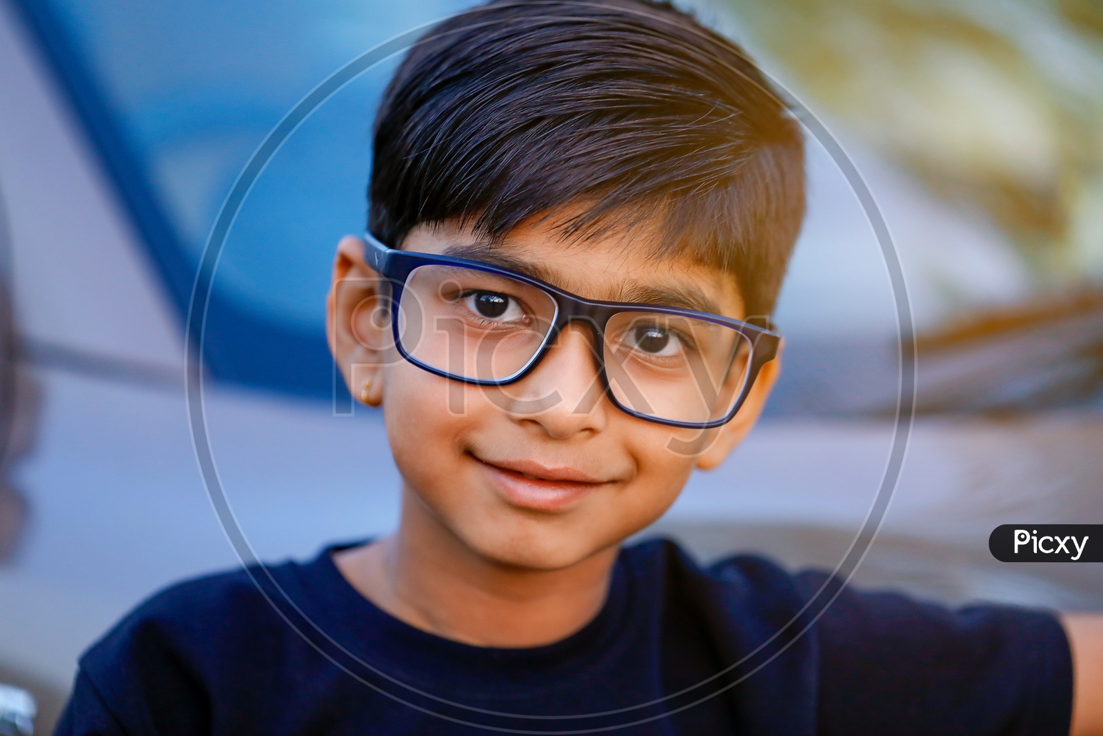 Indian Young Kid or Child Wearing Spectacles And Posing