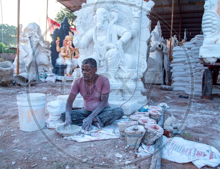 Artist Making Lord Ganesh Idols in Workshop For Ganesh Festival  or Ganesh Chathurdhi