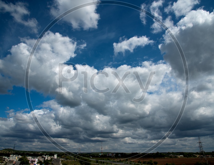 Beautiful Cotton Clouds in Blue Sky Background