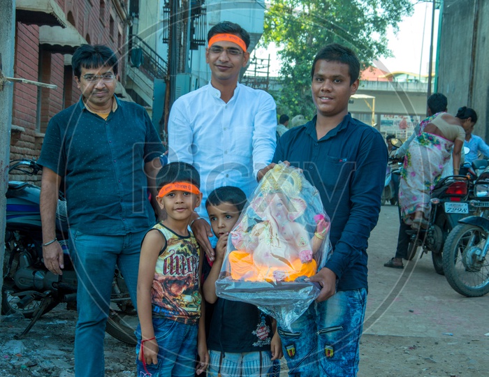 Devotees Purchasing Lord Ganesh Idols From Vendor Stalls For Ganesh Festival