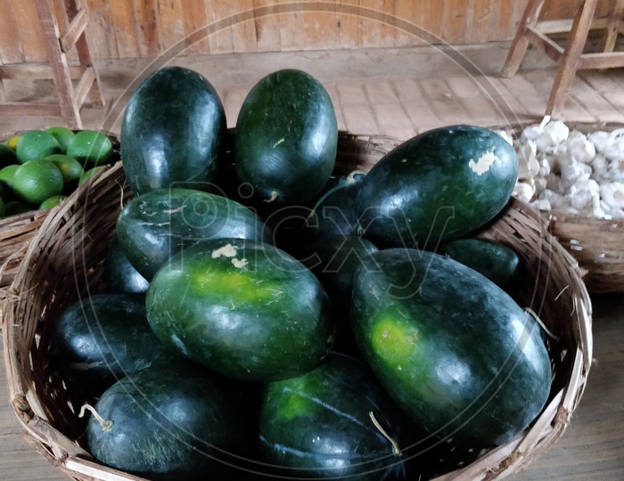 Organic watermelons in a basket