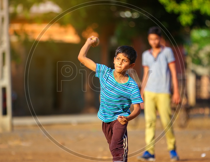 Indian Rural Village Kids Playing Cricket Outdoor