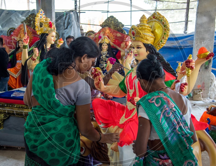 Hindu Goddess Durga Idols Making   Artists Performing making Finishing For Goddess Durga Sculptures Or Idols For Hindu Festival  Dasara or Navrathri