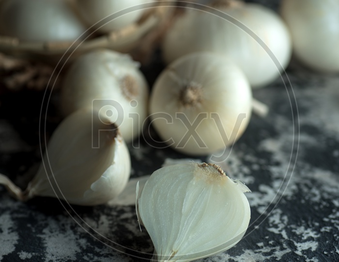 Onions Or White Onions on Stone Texture Background Food Ingredients