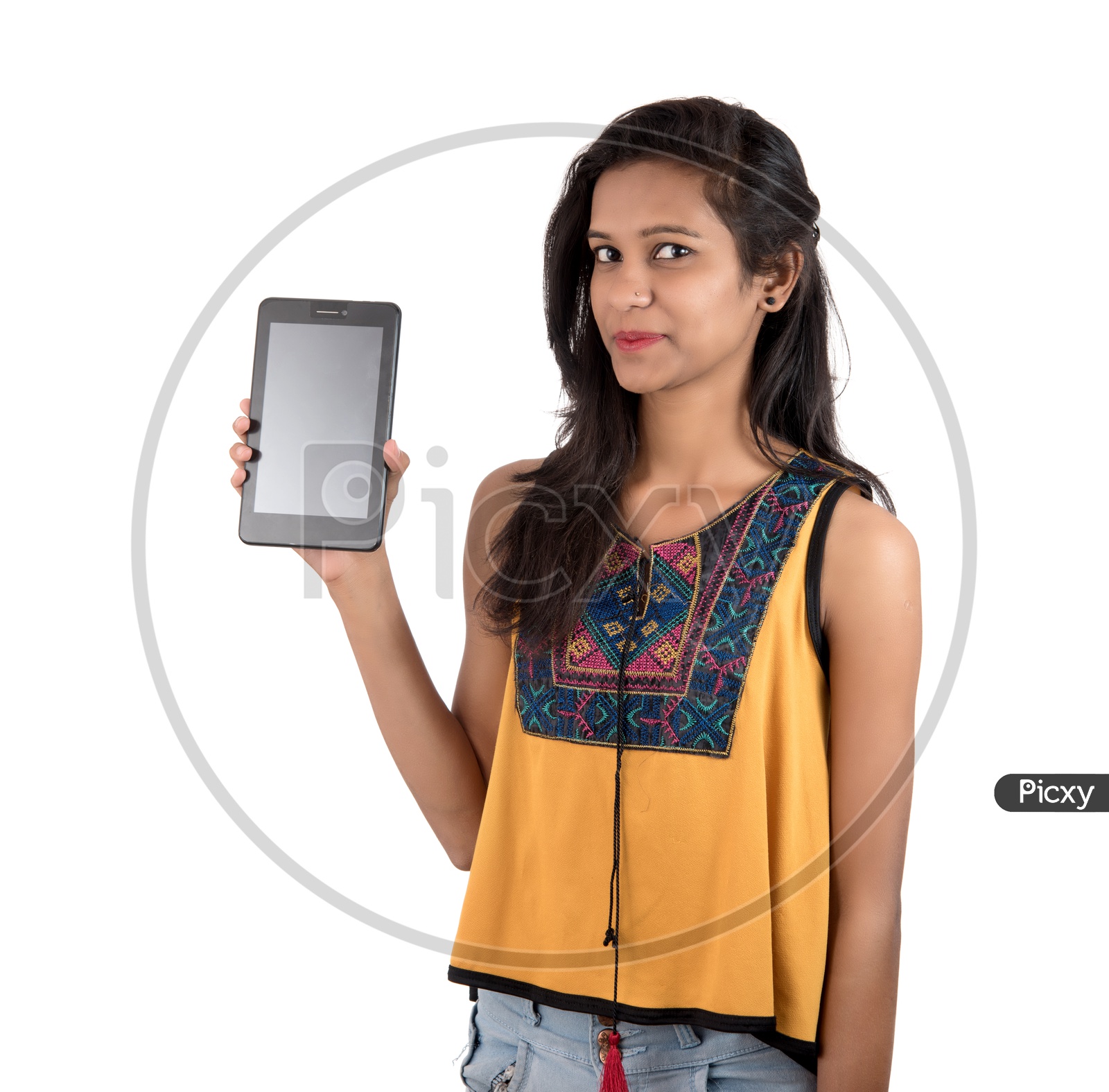 Young Beautiful girl  Showing  Empty Screen of Tab or Tablet Gadget  on an Isolated White  Background