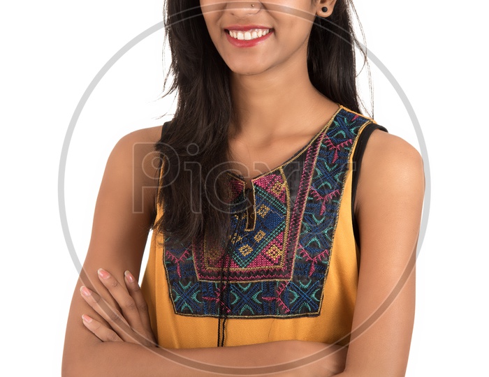 Young Indian Girl  Posing  With a Smile Face On an Isolated White Background