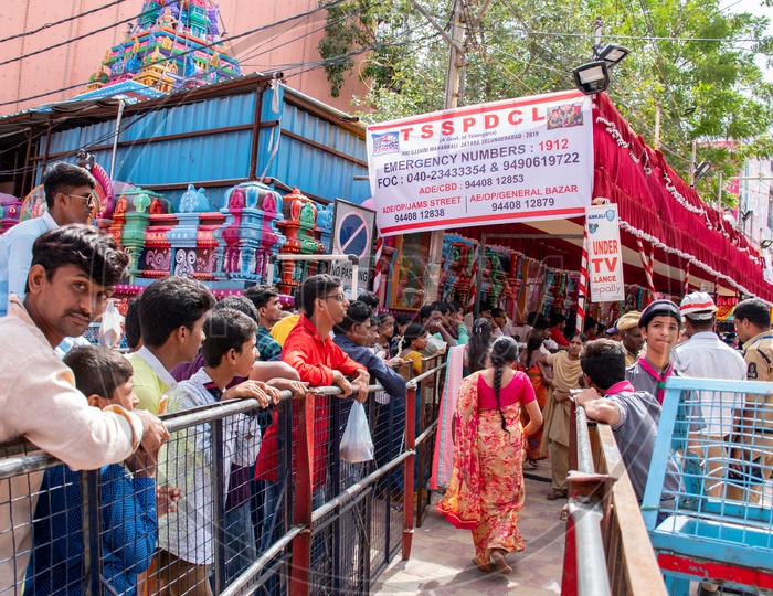 Devotes waiting in queue to darshan goddess mahankali at Mahankali Temple, secunderabad on the eve of bonalu festival.
