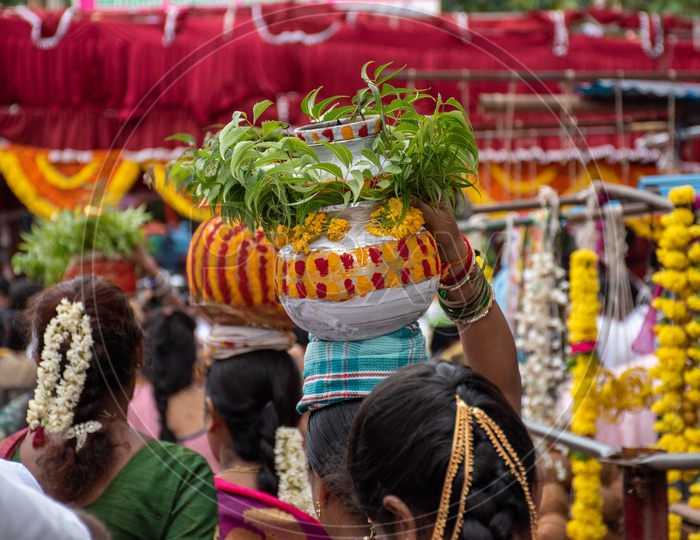 Women offering bonalu at Mahankali Temple, secunderabad on the eve of bonalu festival.