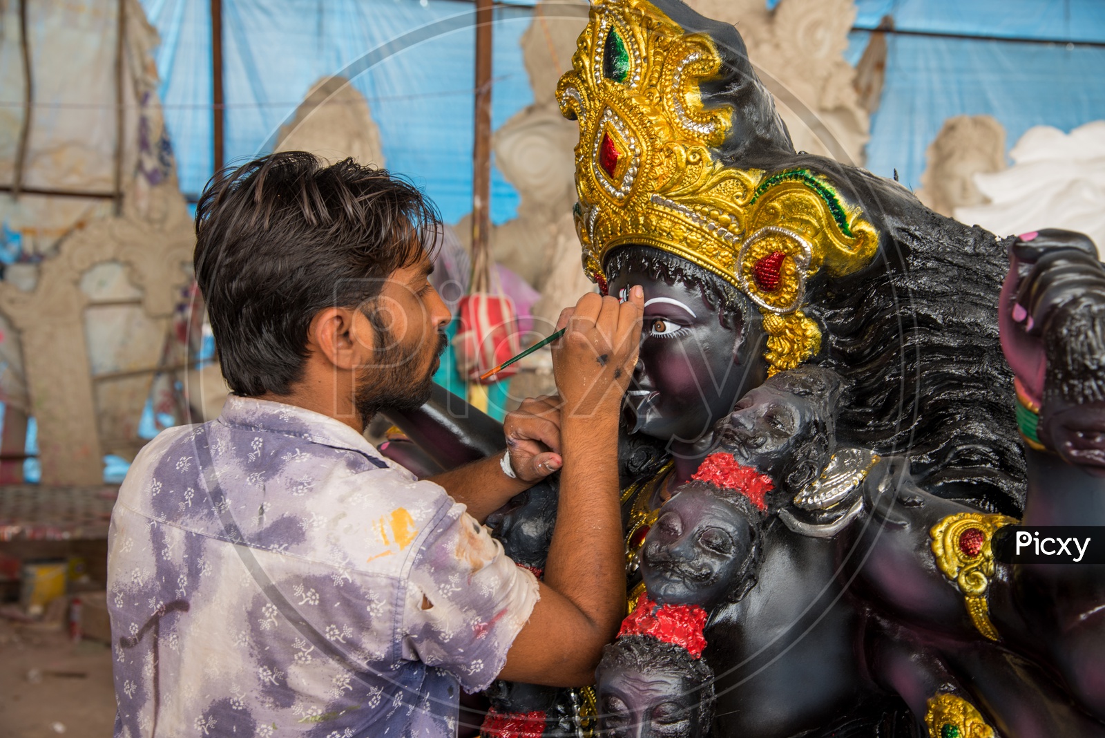 Hindu Goddess Durga Idols Making   Artists Performing making Finishing For Goddess Durga Sculptures Or Idols For Hindu Festival  Dasara or Navrathri