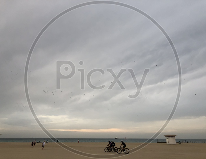 Cyclist in a Beach
