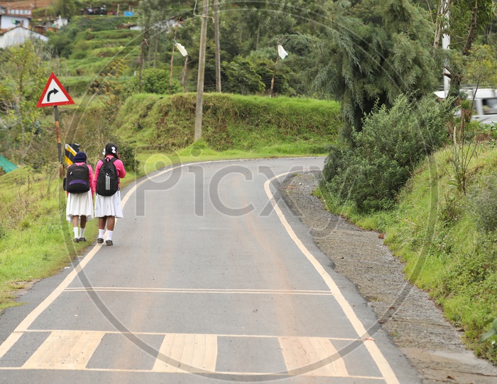 School Going Girl Child in uniform On a Road
