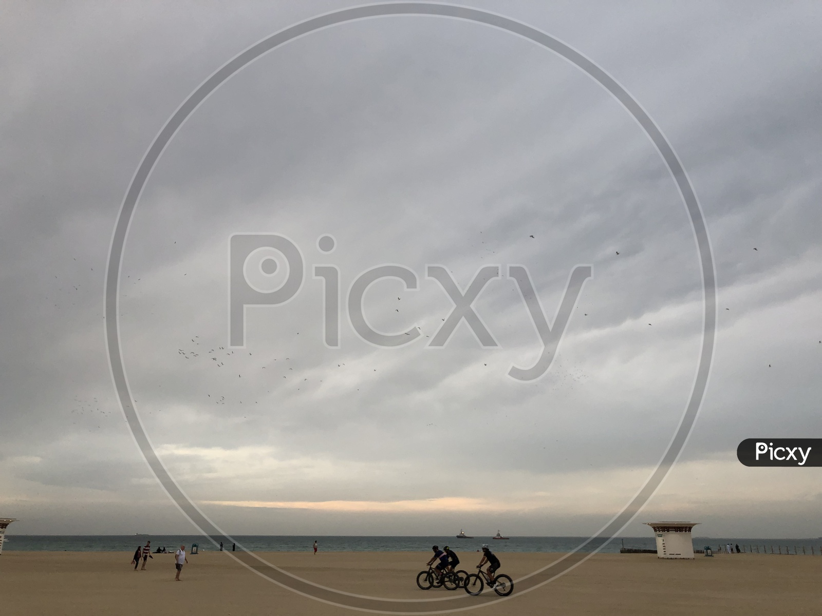 Cyclist in a Beach