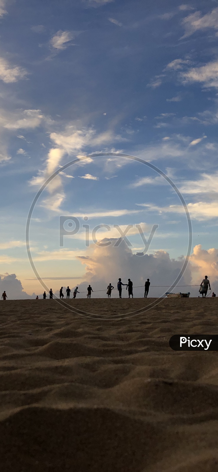 Silhouette Of People in a Beach
